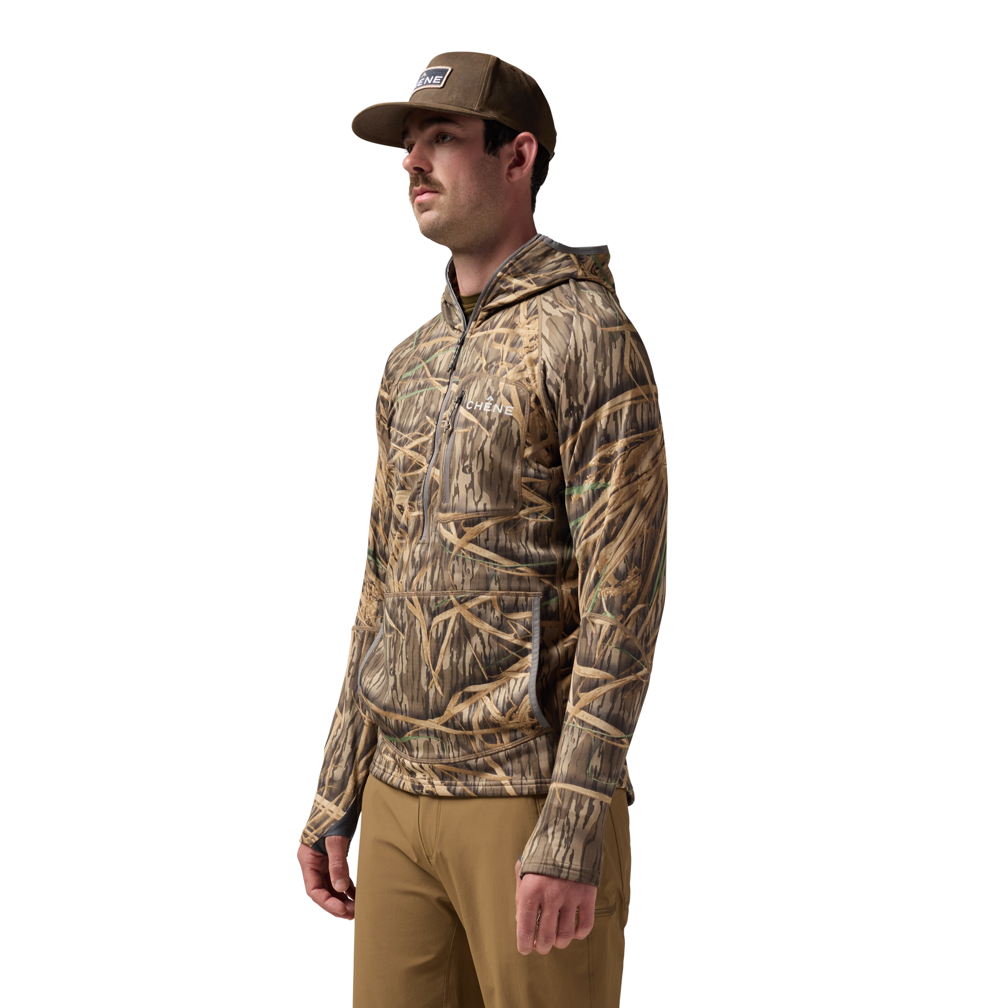 Sixty Series Technical Fleece Half Zip with Hood in Mossy Oak Original Shadow Grass, on model #mossy_oak_original_shadow_grass