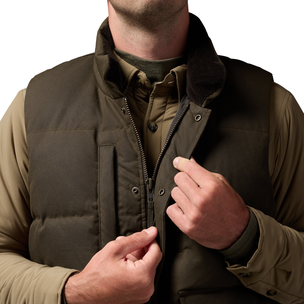 Founder's Reserve Waxed Down Vest in Dark Olive, on model #dark_olive