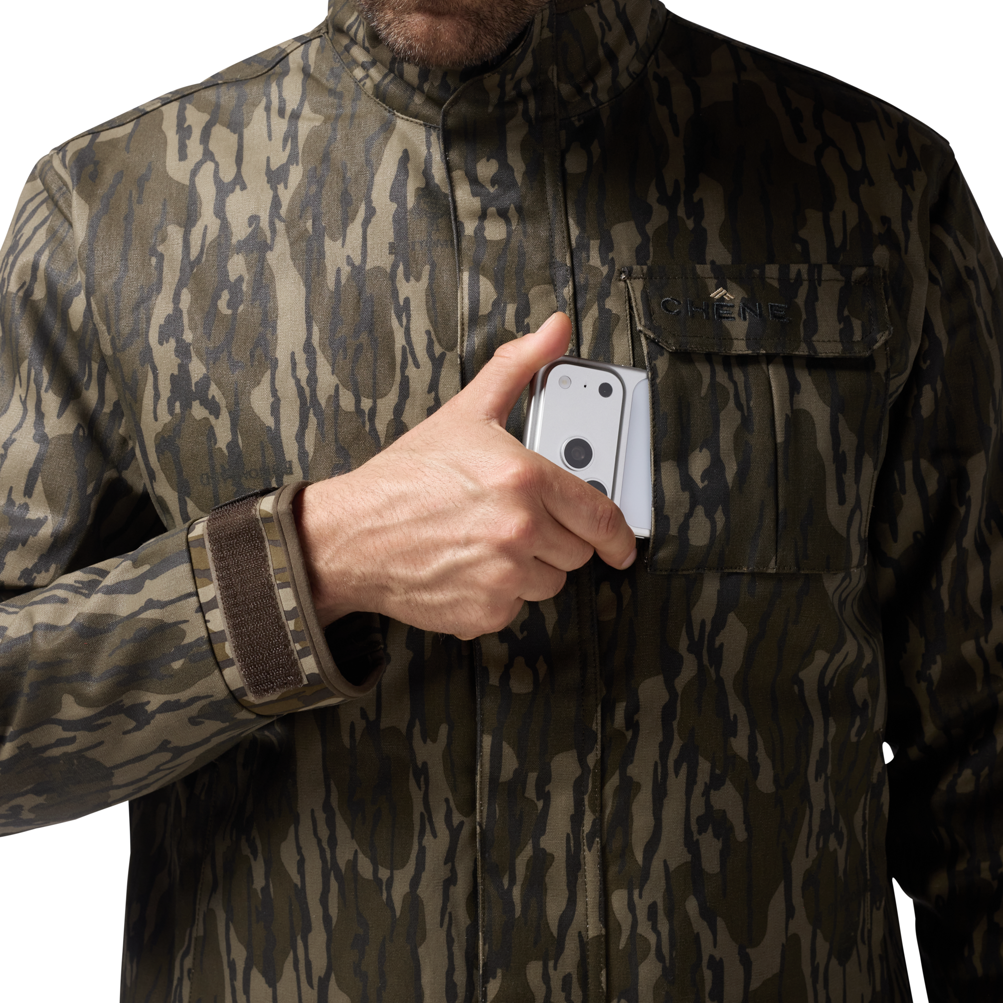 Waxed Canvas Goose Down Jacket in Mossy Oak Original Bottomland, on model #mossy_oak_original_bottomland