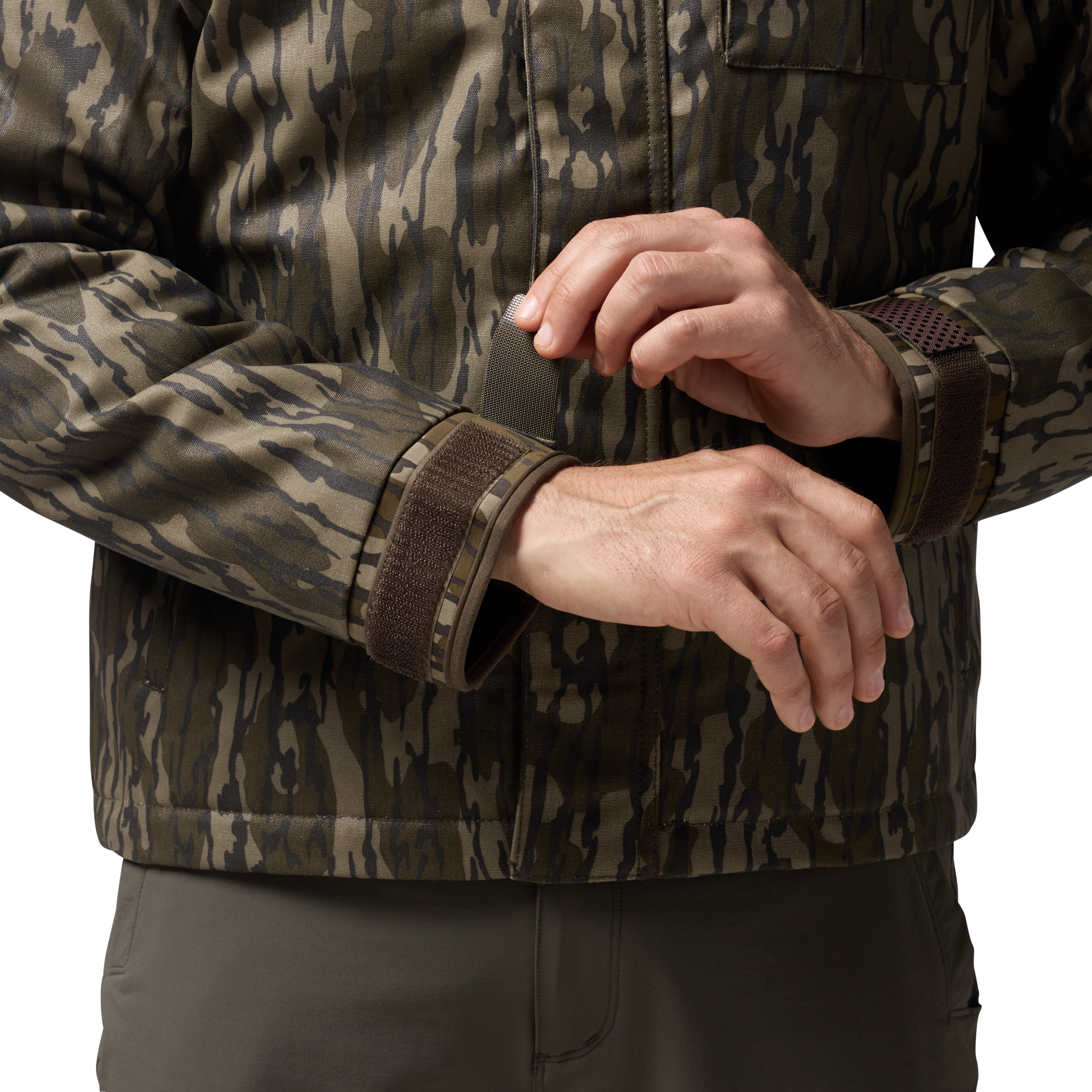 Waxed Canvas Goose Down Jacket in Mossy Oak Original Bottomland, on model #mossy_oak_original_bottomland