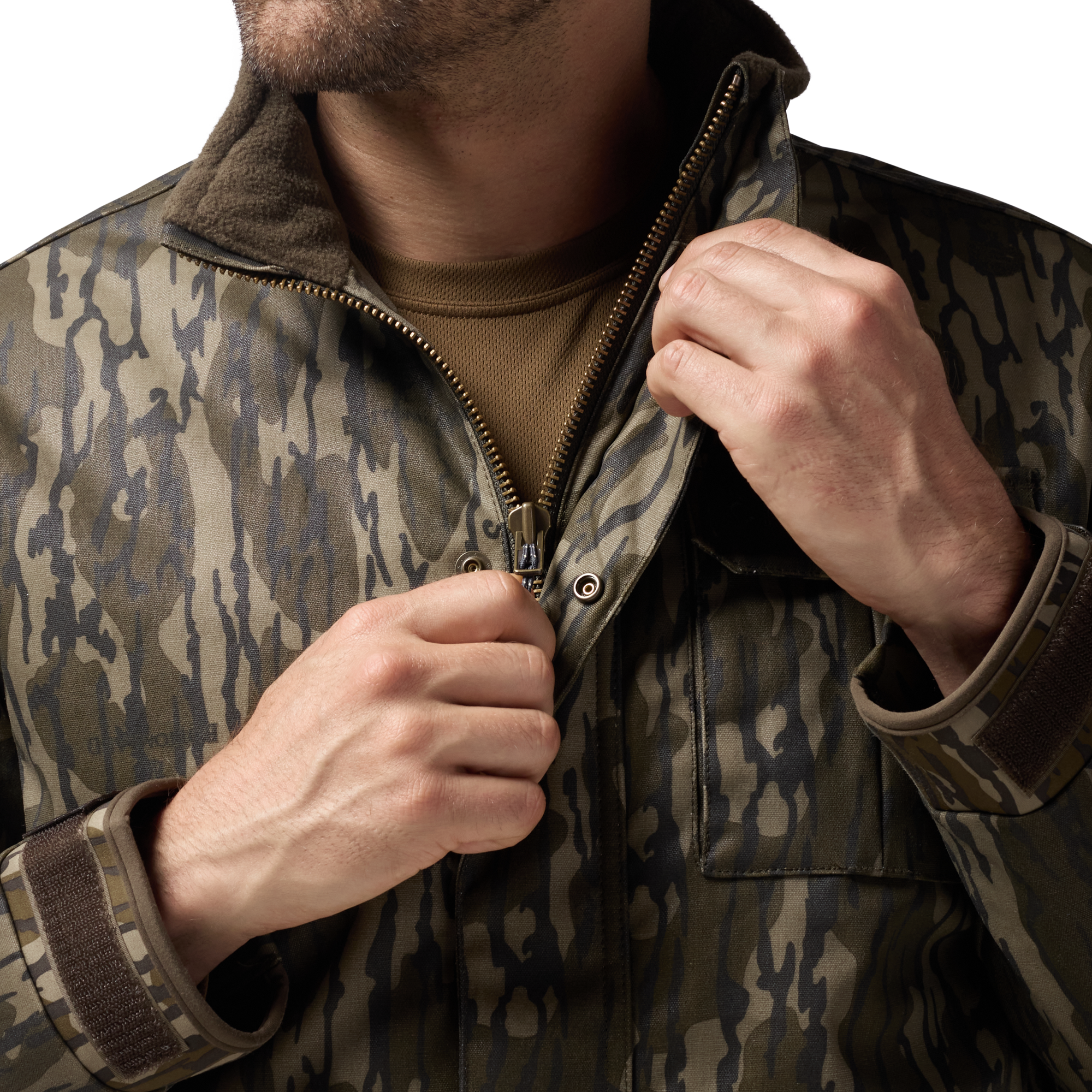 Waxed Canvas Goose Down Jacket in Mossy Oak Original Bottomland, on model #mossy_oak_original_bottomland