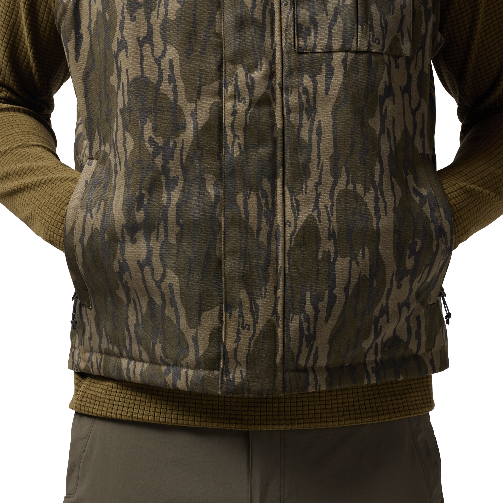 Waxed Canvas Goose Down Vest in Mossy Oak Original Bottomland, on model #mossy_oak_original_bottomland