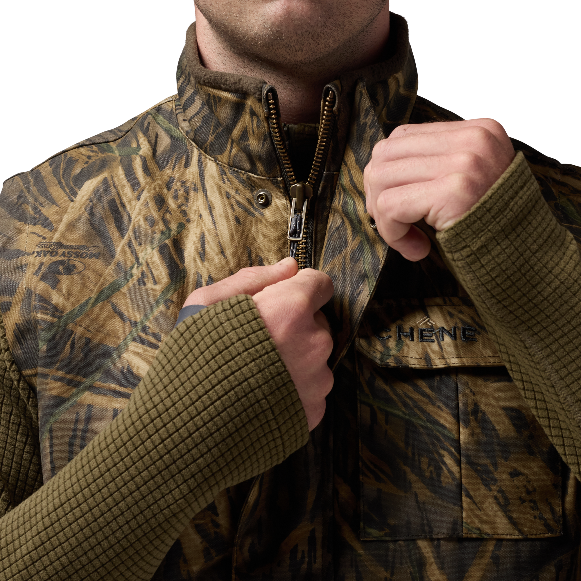 Waxed Canvas Goose Down Vest in Mossy Oak Original Shadow Grass, on model #mossy_oak_original_shadow_grass