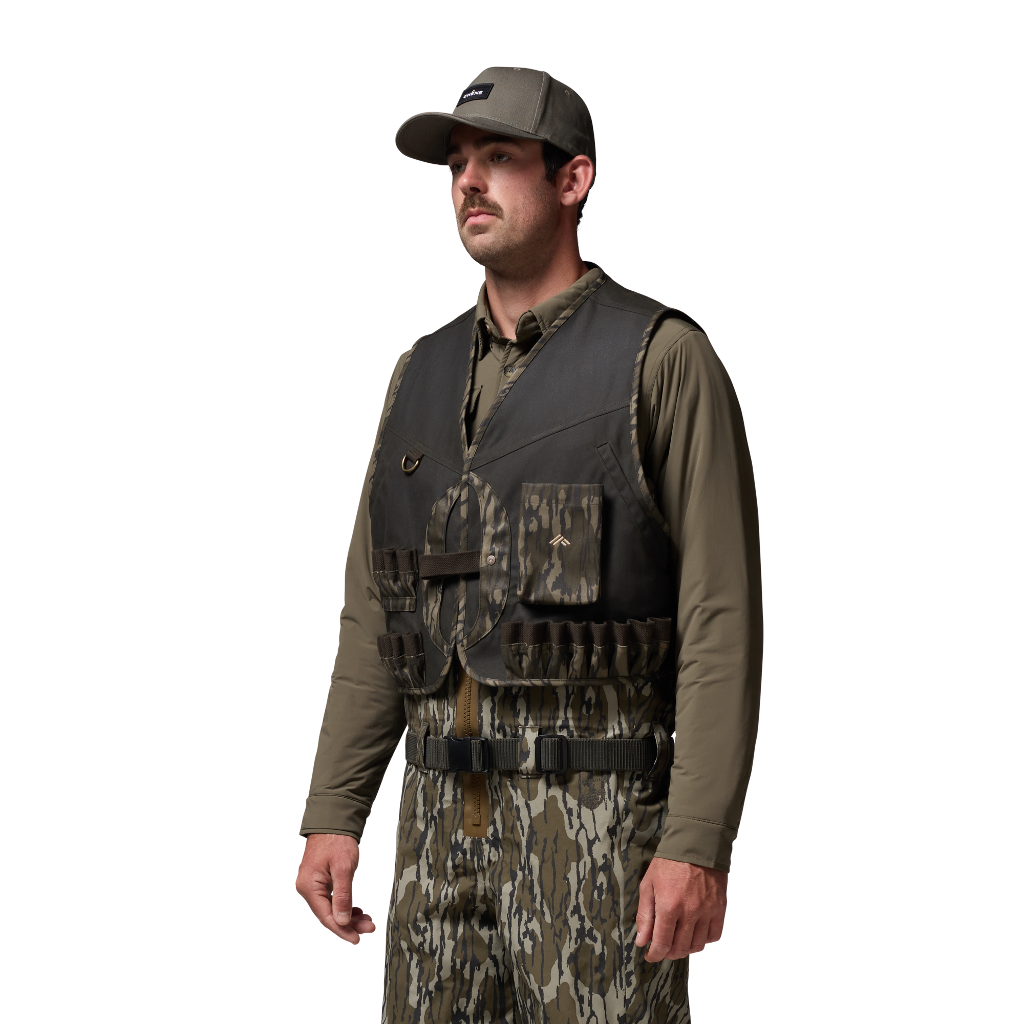Waxed Canvas Wading Vest in Olive / Mossy Oak Original Bottomland, on model #olive_/_mossy_oak_original_bottomland