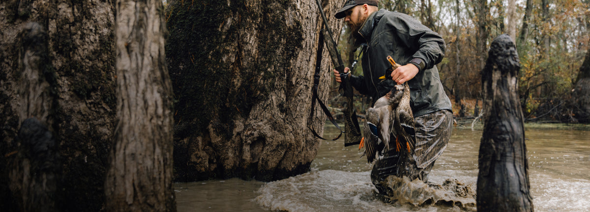 Dawson wading through water, hero, web