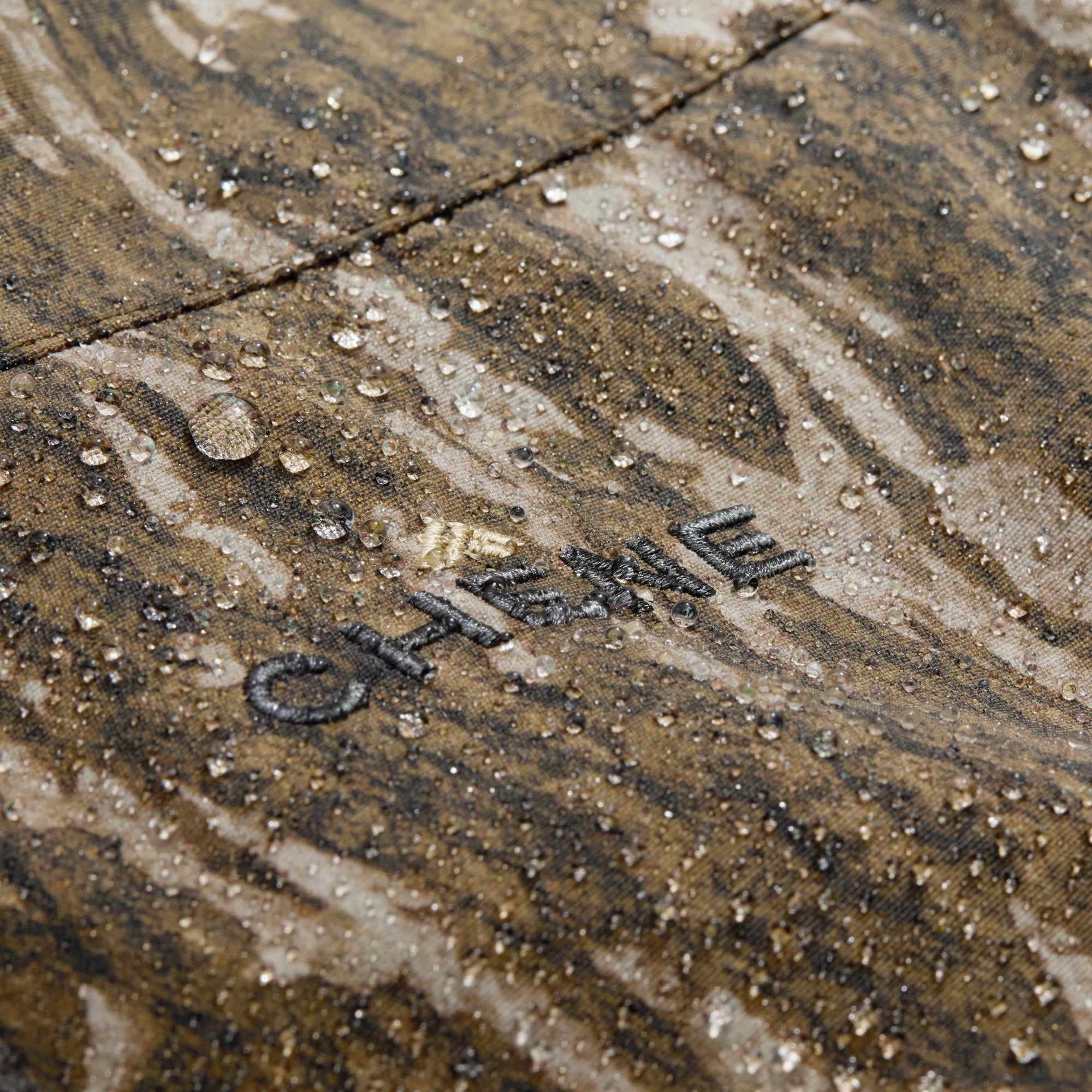 Hydro-Lok Insulated Jacket in Mossy Oak Bottomland, fabric detail #mossy_oak_bottomland