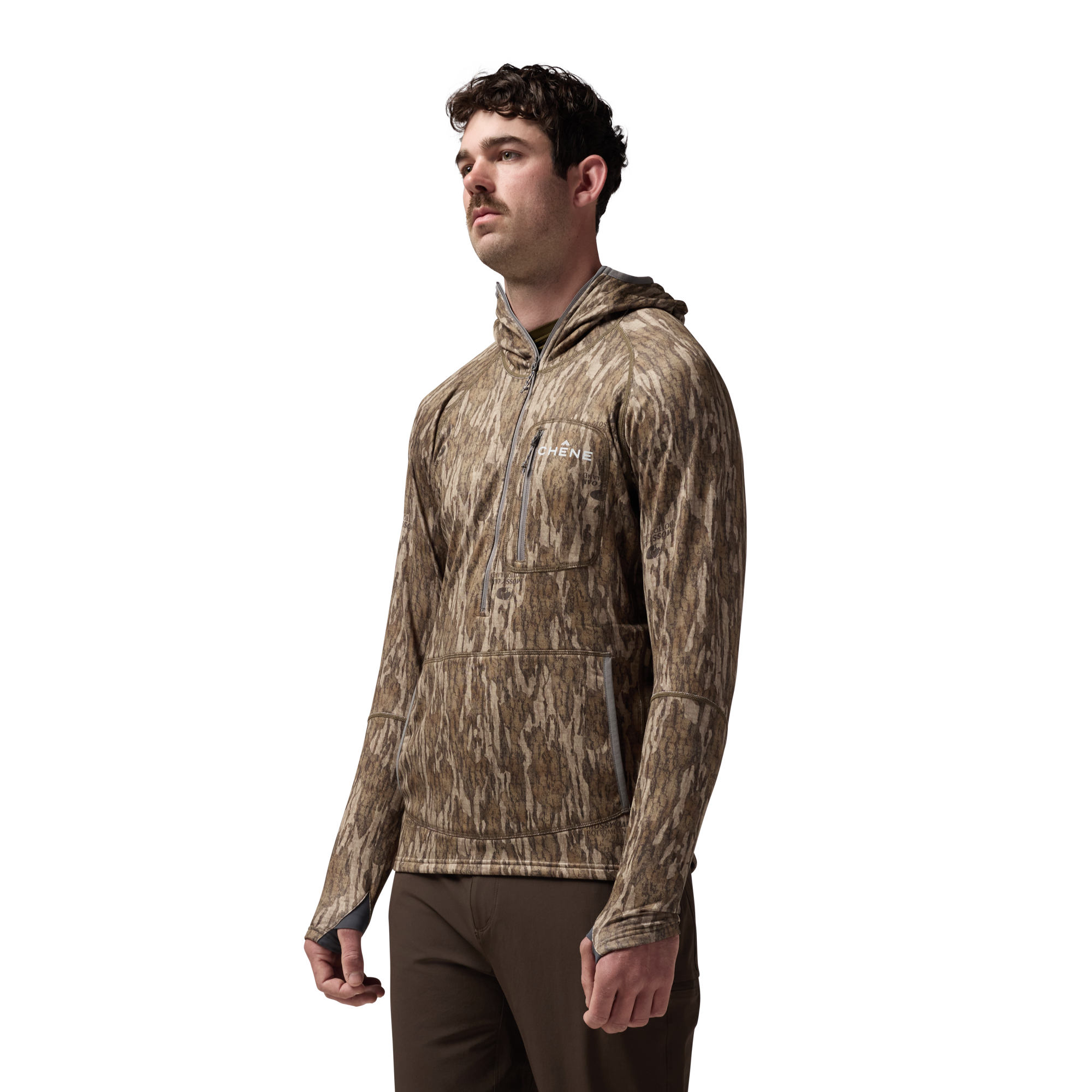 Sixty Series Technical Fleece Half Zip with Hood in Mossy Oak Bottomland, on model #mossy_oak_bottomland