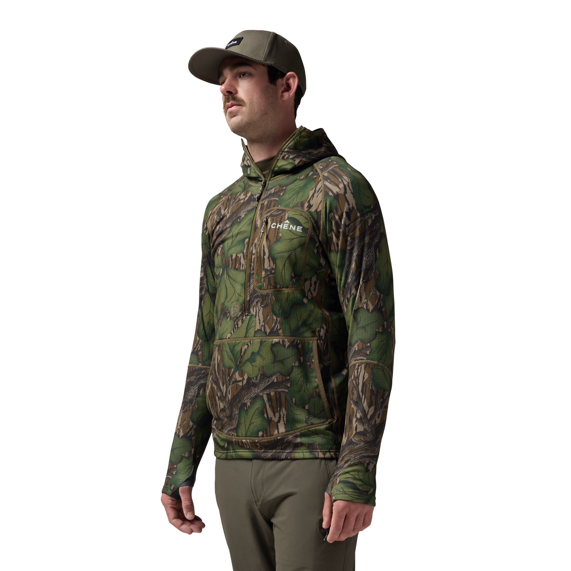 Sixty Series Technical Fleece Half Zip with Hood in Mossy Oak Full Foliage, on model #mossy_oak_full_foliage