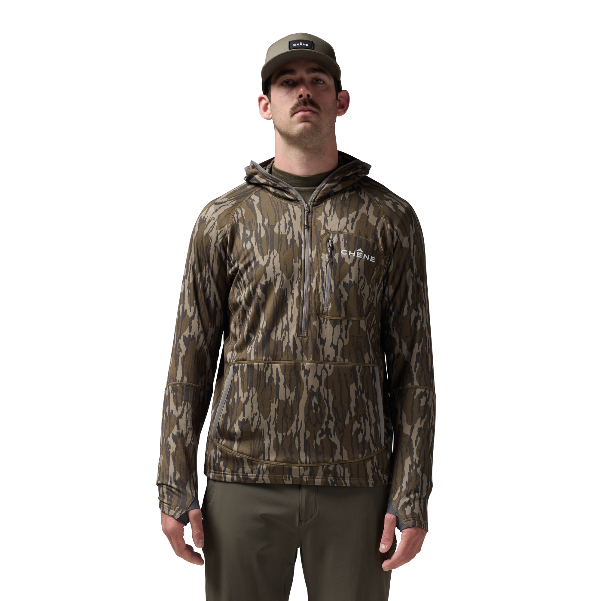 Sixty Series Technical Fleece Half Zip with Hood in Mossy Oak Original Bottomland, on model #mossy_oak_original_bottomland