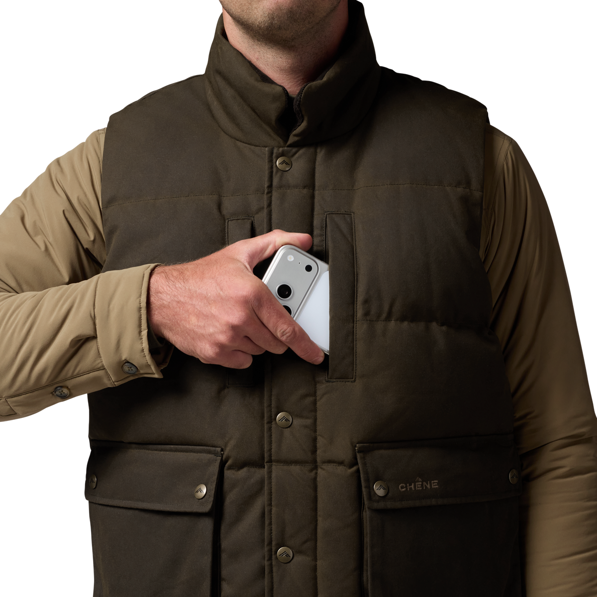 Founder's Reserve Waxed Down Vest in Dark Olive, on model #dark_olive