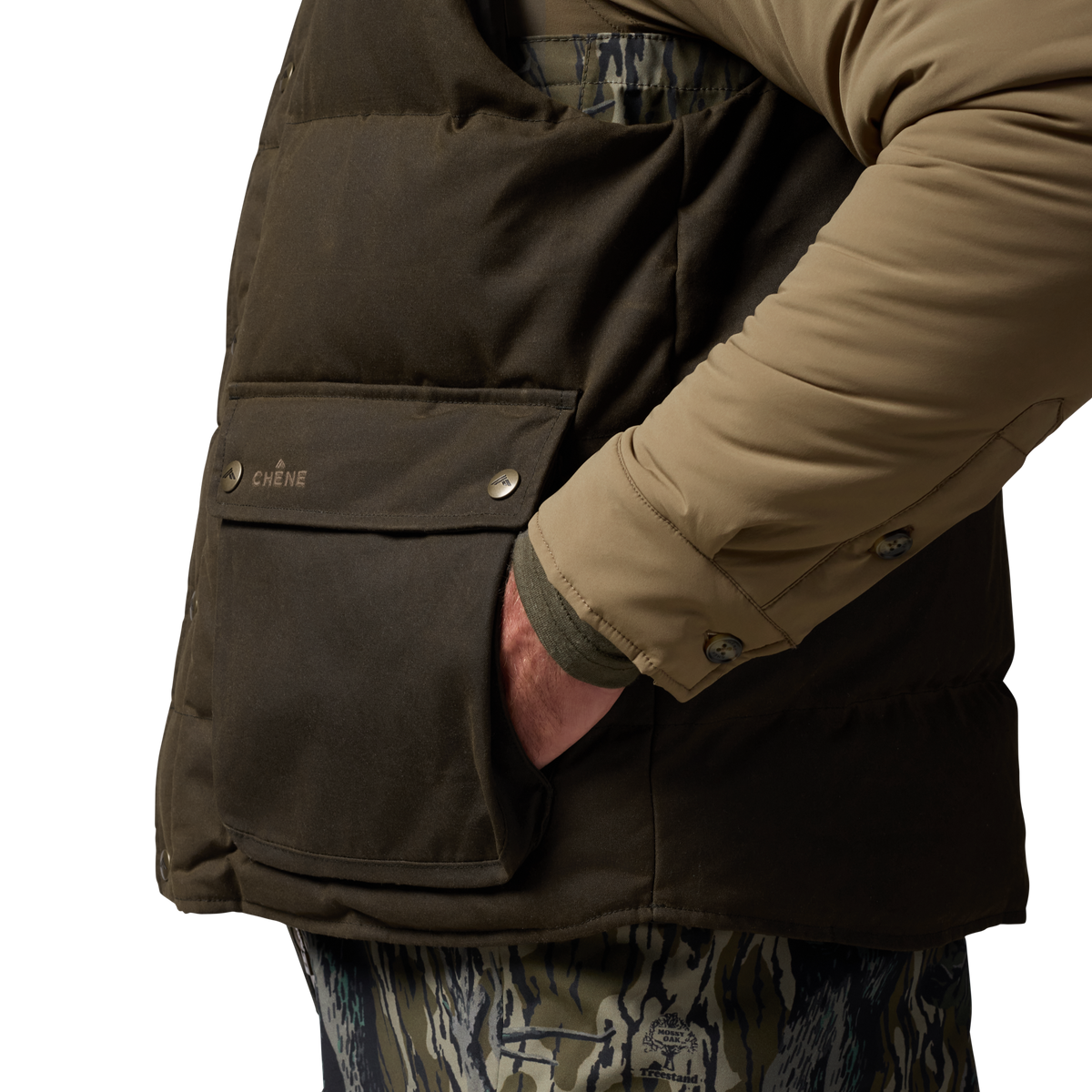Founder's Reserve Waxed Down Vest in Dark Olive, on model #dark_olive