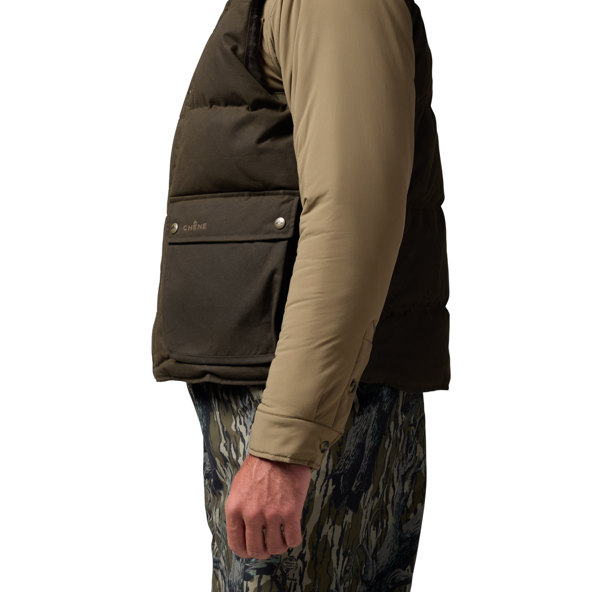 Founder's Reserve Waxed Down Vest in Dark Olive, on model #dark_olive