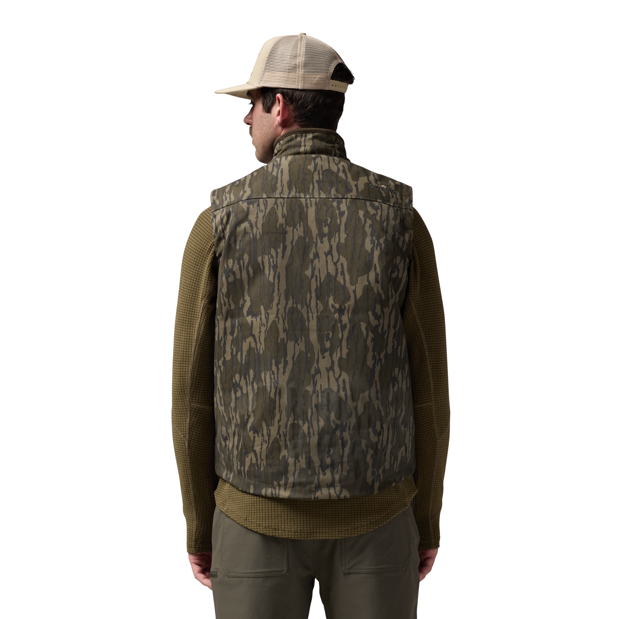 Waxed Canvas Goose Down Vest in Mossy Oak Original Bottomland, on model #mossy_oak_original_bottomland