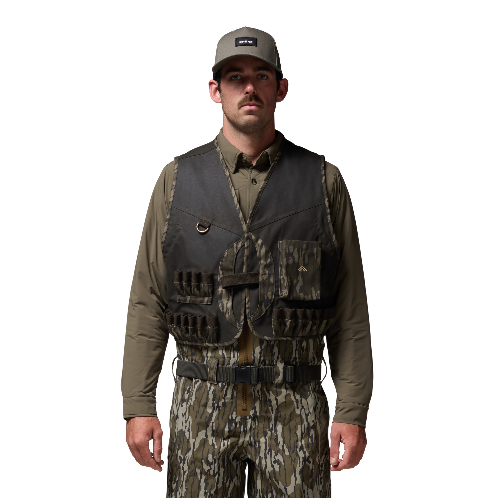 Waxed Canvas Wading Vest in Olive / Mossy Oak Original Bottomland, on model #olive_/_mossy_oak_original_bottomland