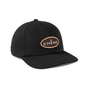 a black baseball cap with a brown logo