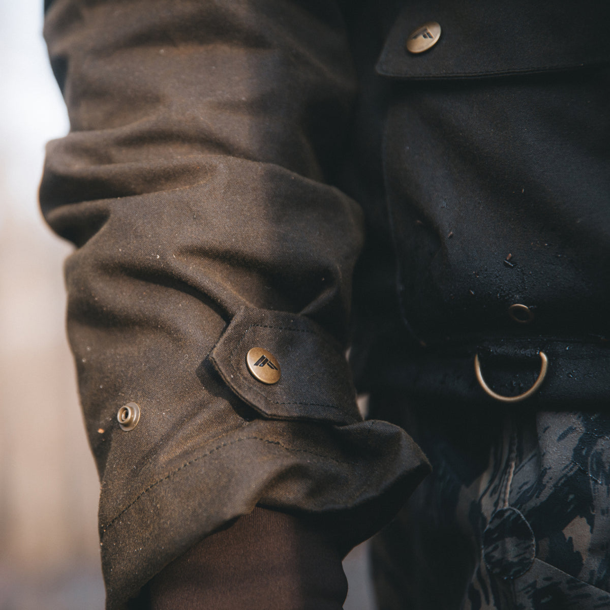 Founders' Reserve waxed cotton, antique brass button detail